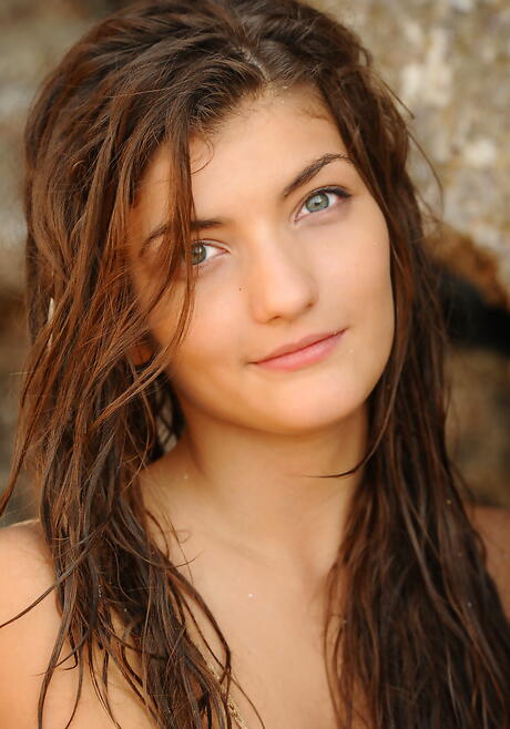 Stunning youthful Ryanel A uncovering tiny tits and hot butt at beach