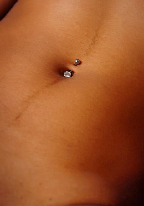 Slender brunette hottie Belinda A unveils small tits and spreads her legs 