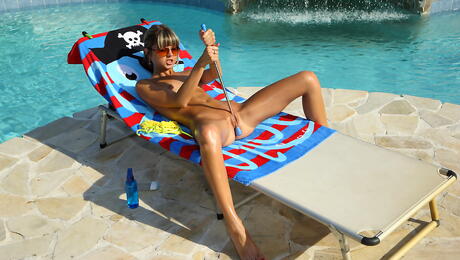 Foxy russian youthful Gina Gerson in fancy bikini plays with sex toy near the pool